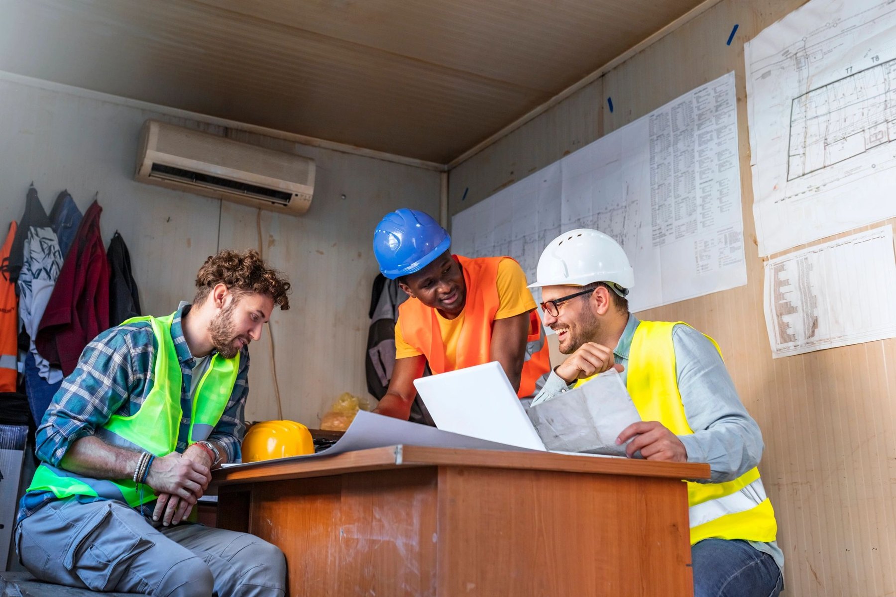 Construction professionals reviewing plans